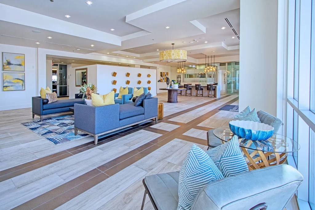 Modern clubhouse interior with lounge seating.